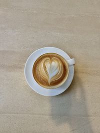 High angle view of caffè latte on table