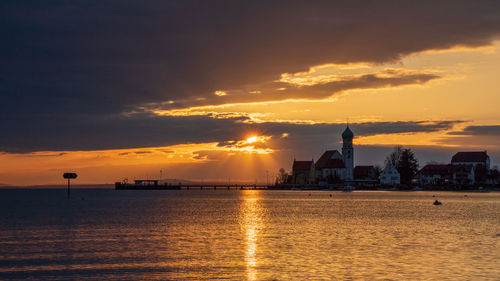 Wasserburg with its jetty in the sunset