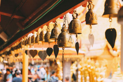 Low angle view of lanterns hanging at market stall