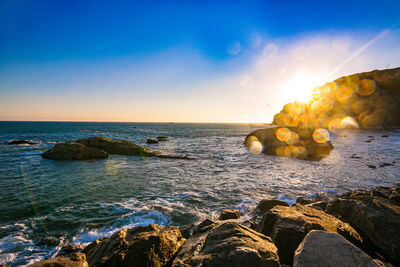 Scenic view of sea against sky during sunset