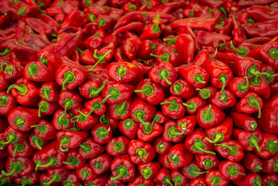 Full frame shot of red chili peppers for sale at market stall