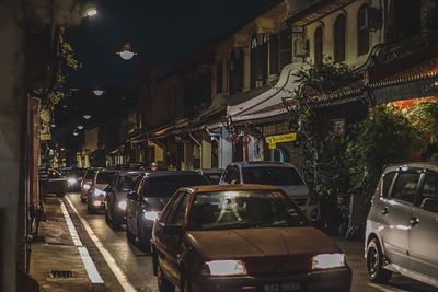People on city street at night