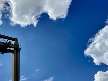 Low angle view of street light against sky