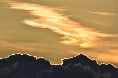 Low angle view of dramatic sky during sunset