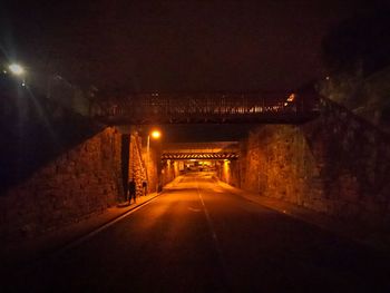 Illuminated road at night