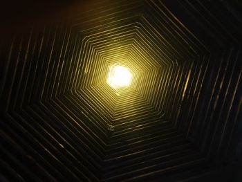 Low angle view of illuminated lamp