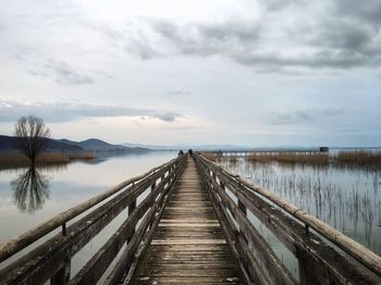 Wooden jetty over lake