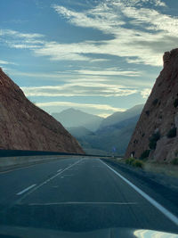 Empty road against sky