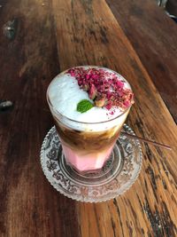 High angle view of drink in glass on table