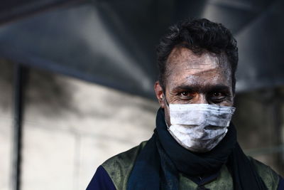 Close-up of man wearing mask