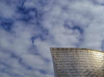 Low angle view of modern building against sky