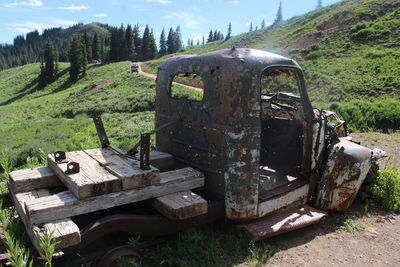 Abandoned truck on field