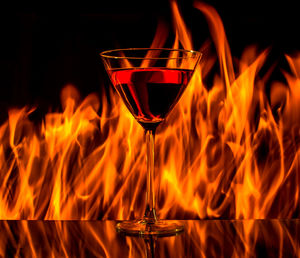 Close-up of fire in wineglass
