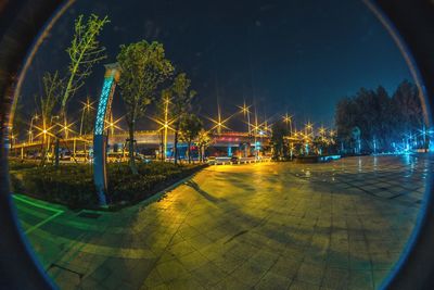 View of illuminated street at night