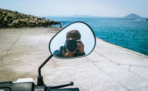 Reflection of woman in water