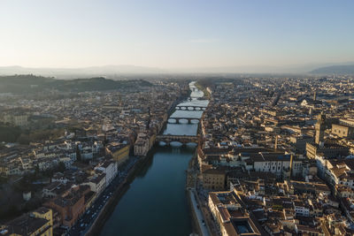 Aerial view of florence along the arno river and the old town from above, tuscany, italy,