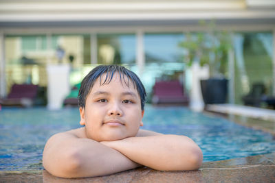 Portrait of boy in swimming pool