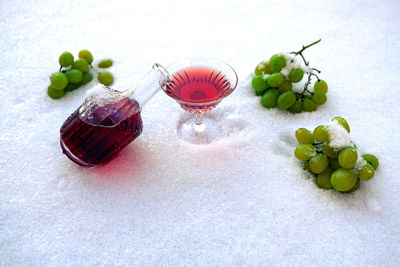 High angle view of fruits in glass on table