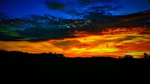 Scenic view of dramatic sky during sunset