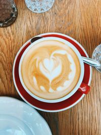 High angle view of cappuccino on table