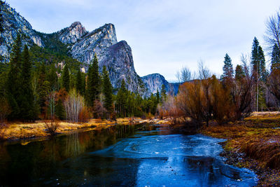  beautiful  yosemite national park three brothers  snow covered mountain range with river and trees