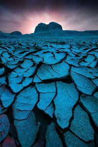 Scenic view of landscape against sky during winter