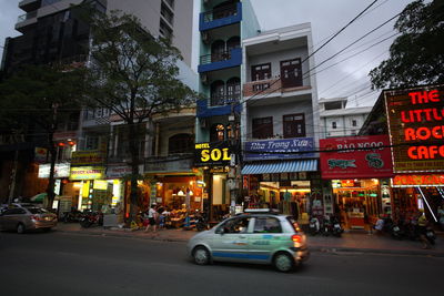 Cars on street in city at night