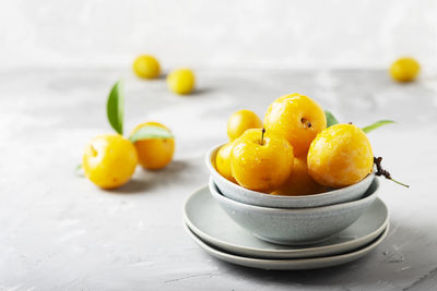 Close-up of fruits in bowl on table