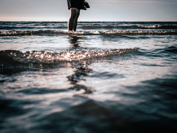 Low section of person on beach