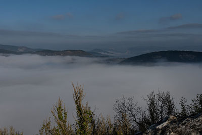 Scenic view of mountains against sky