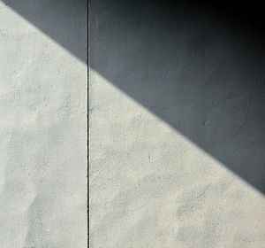 High angle view of shadow on wall