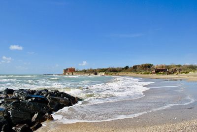 Scenic view of beach against sky