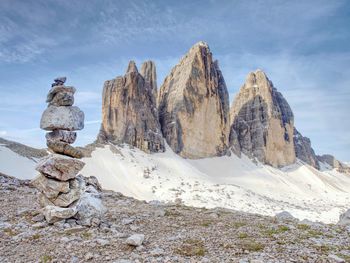 Pebbles pyramid. stones on alpine gravel at tre cime di lavaredo. tour around at april midday