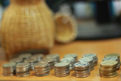 Close-up of coins on table