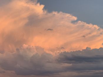 Low angle view of clouds in sky during sunset