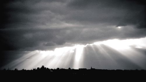 Storm clouds over cloudy sky