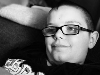 Close-up portrait of boy wearing eyeglasses