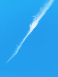 Low angle view of vapor trail in sky