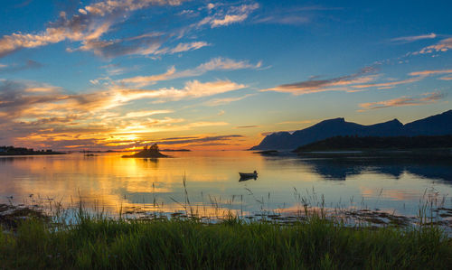 Scenic view of sea at sunset