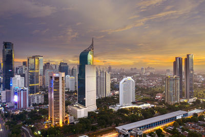 Modern buildings in city against sky