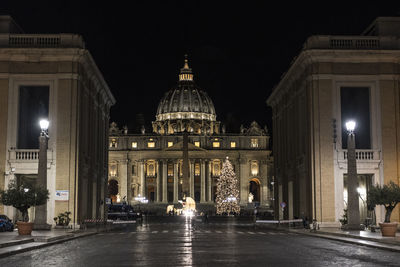 Illuminated building at night