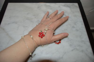 High angle view of woman hand on wall