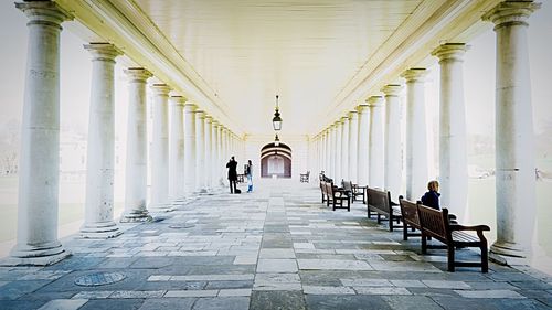 Tourists in corridor