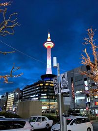 Low angle view of illuminated buildings against sky