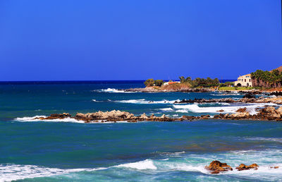 Scenic view of sea against clear sky