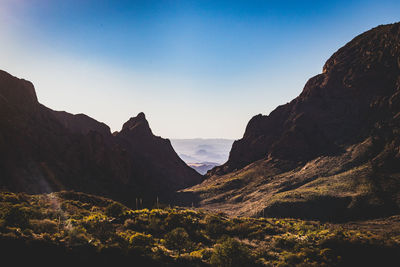 Scenic view of mountains against clear sky