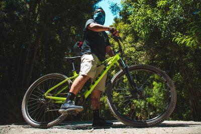 Man riding bicycle in park