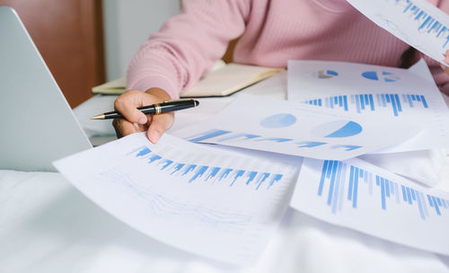 Low angle view of a person working on table