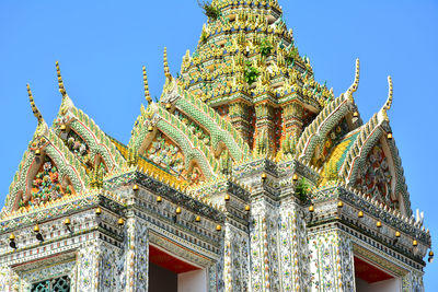 Low angle view of temple against building