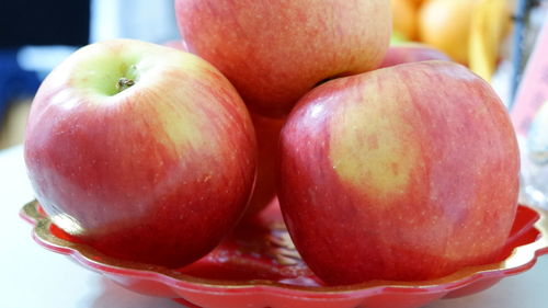 Close-up of apples on table